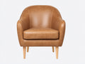 Sillones tapizados en piel sintética marrón claro 77x74x82 cm - patas de madera natural - diseño curvo para salón